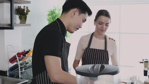 Coffee shop concept of 4k Resolution. Employees are working together to cre.. Stock Footage 250016451