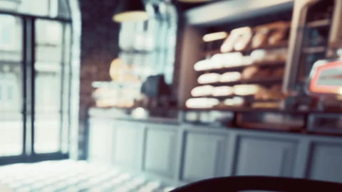Coffee shop interior with display case and blurred background Stock Footage 344875867