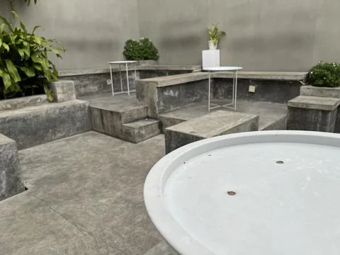 Coffee shop interior featuring table and chair with modern design. Stock Photos