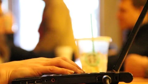 Coffee Shop Laptop Stock Footage 1069126