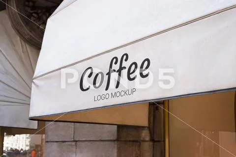 Coffee shop logo mockup on white awning. Traditional look of white white set in  PSD-Vorlage