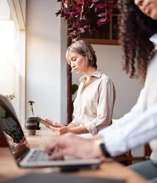 Coffee shop, remote work and people on computer, tablet and internet for online Stock Photos