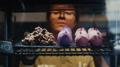 Coffee Shop Setup with Macarons and Baked Goods Stockbeeldmateriaal 313351838