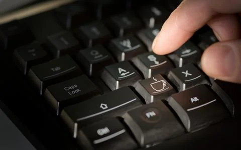 Coffee sign on computer keyboard Free Stock Photos