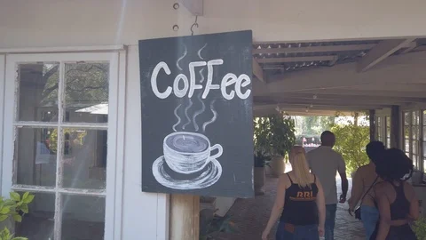 Coffee sign outside a coffee shop Stock Footage