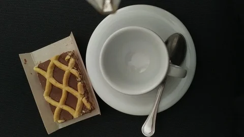 Coffee with a slice of cake. Stock Footage 112948320