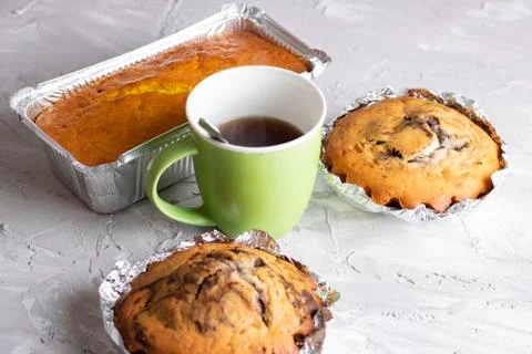 Coffee ,a slice of cake on the plate on the background of cake Stock Photos
