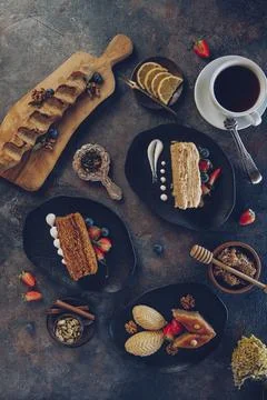 Coffee,a slice of cake on the plate on the background of the cake Stock Photos