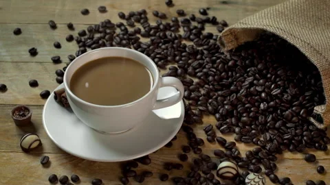 Coffee Slow Motion Drip in Coffee Cup Stock Footage 143556261