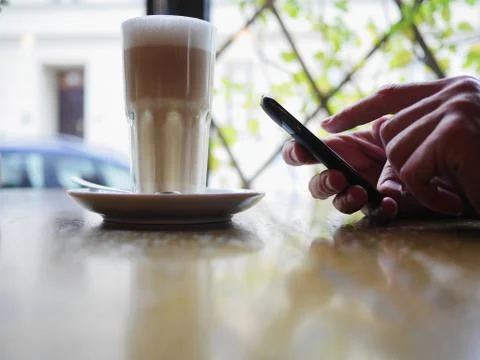 Coffee smartphone Stock Photos
