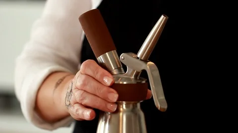 Coffee Sparkling Nitro Cold Brew Coffee pouring to glass and ready to drink. Stock Footage 89945041