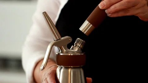 Coffee Sparkling Nitro Cold Brew Coffee pouring to glass and ready to drink. Stock Footage 89945100