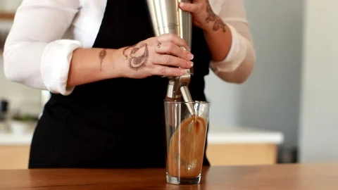 Coffee Sparkling Nitro Cold Brew Coffee pouring to glass and ready to drink. Stock Footage 89945391