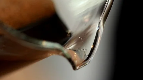 Coffee Sparkling Nitro Cold Brew Coffee pouring to glass and ready to drink. Stock Footage 89945517