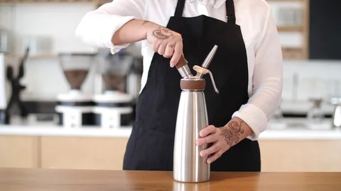 Coffee Sparkling Nitro Cold Brew Coffee pouring to glass and ready to drink. Stock Footage 90131940