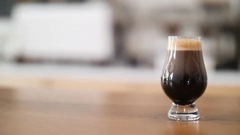 Coffee Sparkling Nitro Cold Brew Coffee pouring to glass and ready to drink. Stock Footage 90131971