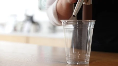 Coffee Sparkling Nitro Cold Brew Coffee pouring to glass and ready to drink. Stock Footage 90132025