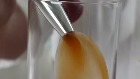 Coffee Sparkling Nitro Cold Brew Coffee pouring to glass and ready to drink. Stock Footage 94336621