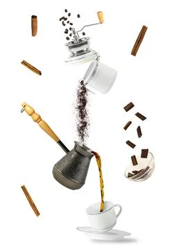Coffee spilling into cup 스톡 사진