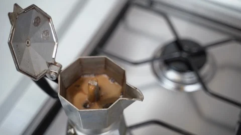Coffee spills from the coffee maker Stock Footage 123894684