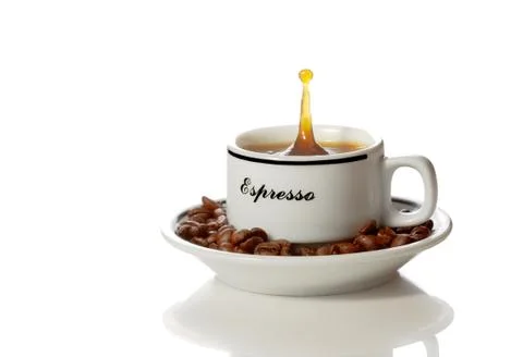 Coffee splash Stock Photos