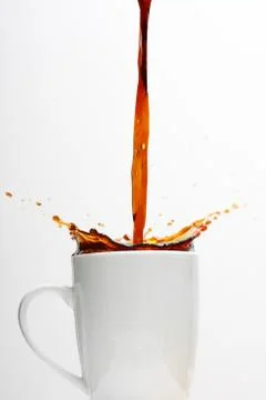 Coffee splashing Stock Photos
