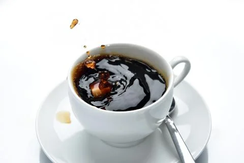 Coffee splashing Stock Photos