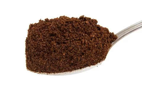 Coffee in the spoon Stock Photos