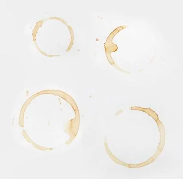Coffee stains on plain paper Stock Photos