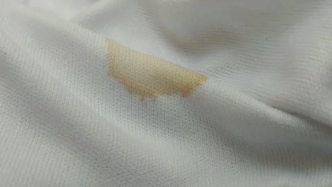 Coffee stains on white clothes. Видео 313418469