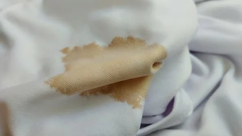 Coffee stains on white clothes. Видео 313418520