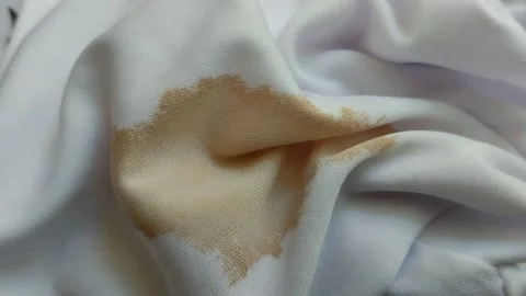 Coffee stains on white clothes. Видео 313418529