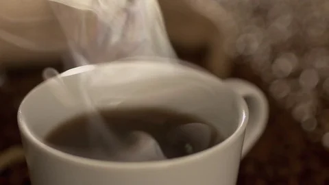 Coffee with steam in slow motion Stock Footage 76100323