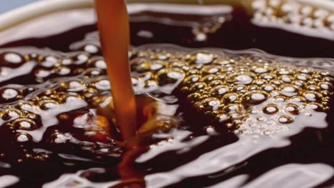 Coffee stirring close-up - coffee dripping Stock Footage 257985245
