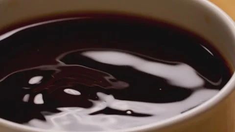 Coffee stirring close-up - fragrant coffee dripping Stock Footage 257985175