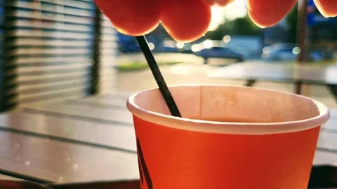 Coffee stirring sugar in the open air Stock Footage 248483347