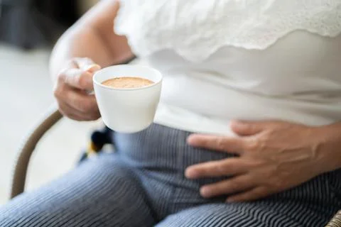 Coffee Stomach Ache. Digesting Acid Pain Stock Photos