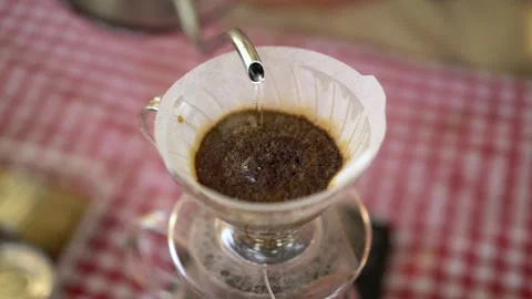 Coffee Street vender doing pour over coffee by the road side in Java Stock Footage 150604848