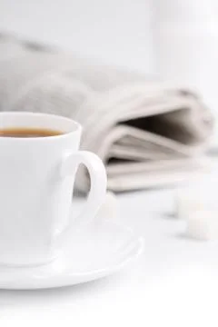 Coffee, sugar and stack of newspapers Stock Photos