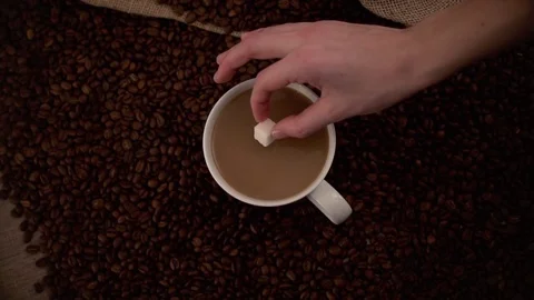 Coffee with sugar in slow motion Stock Footage 76100768