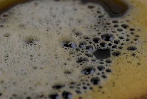 Coffee surface texture. Foam bubbles in detail. Coffee foam close-up, macro Stock-Fotos