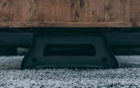 Coffee table base on plush rug 스톡 사진
