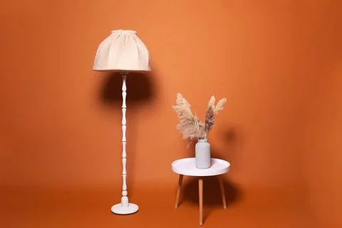 Coffee table lamp on brown background Stock Photos