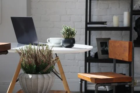 Coffee table with laptop 写真素材