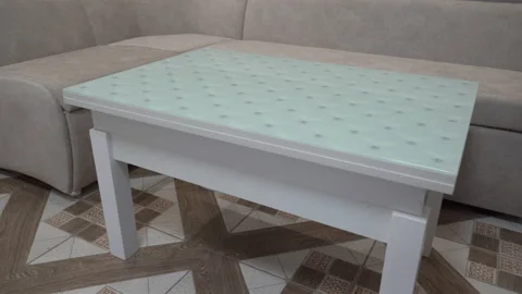 A coffee table with a sofa Stock Footage 237316221