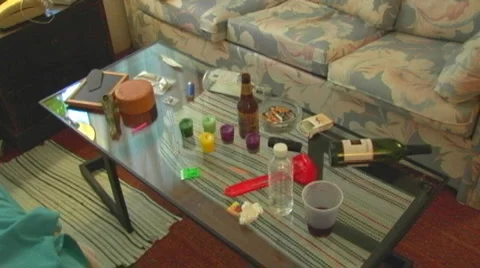 Coffee Table Strewn With Party Stuff Stock Footage