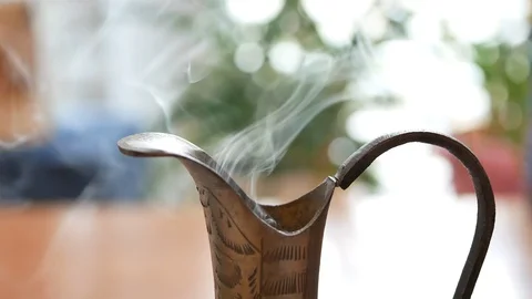 Coffee tea steam from silver jug Stock Footage 95889802