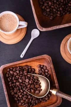 Coffee theme. Flat lay. Hot cups of coffee and plate with coffee beans. 스톡 사진
