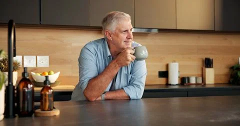 Coffee, thinking and senior man in kitchen for memory, reflection and plann.. Stock Photos