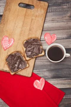 Coffee, toast and chocolate paste, romantic breakfast on Valentine's Day Stock Photos